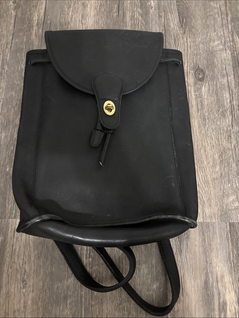 Coach Black Leather Drawstring Backpack with Gold Turnlock
